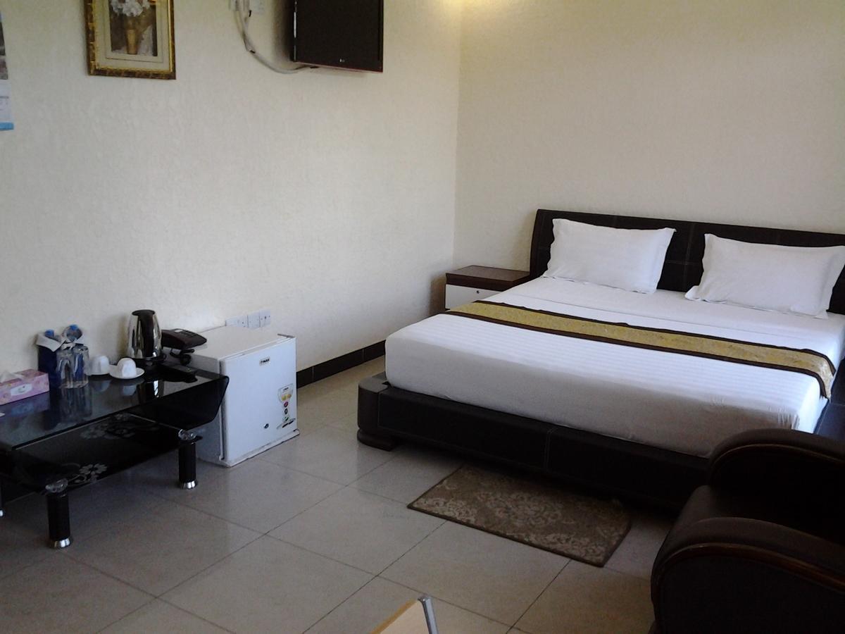 Best Point Hotel Daressalam Zimmer foto