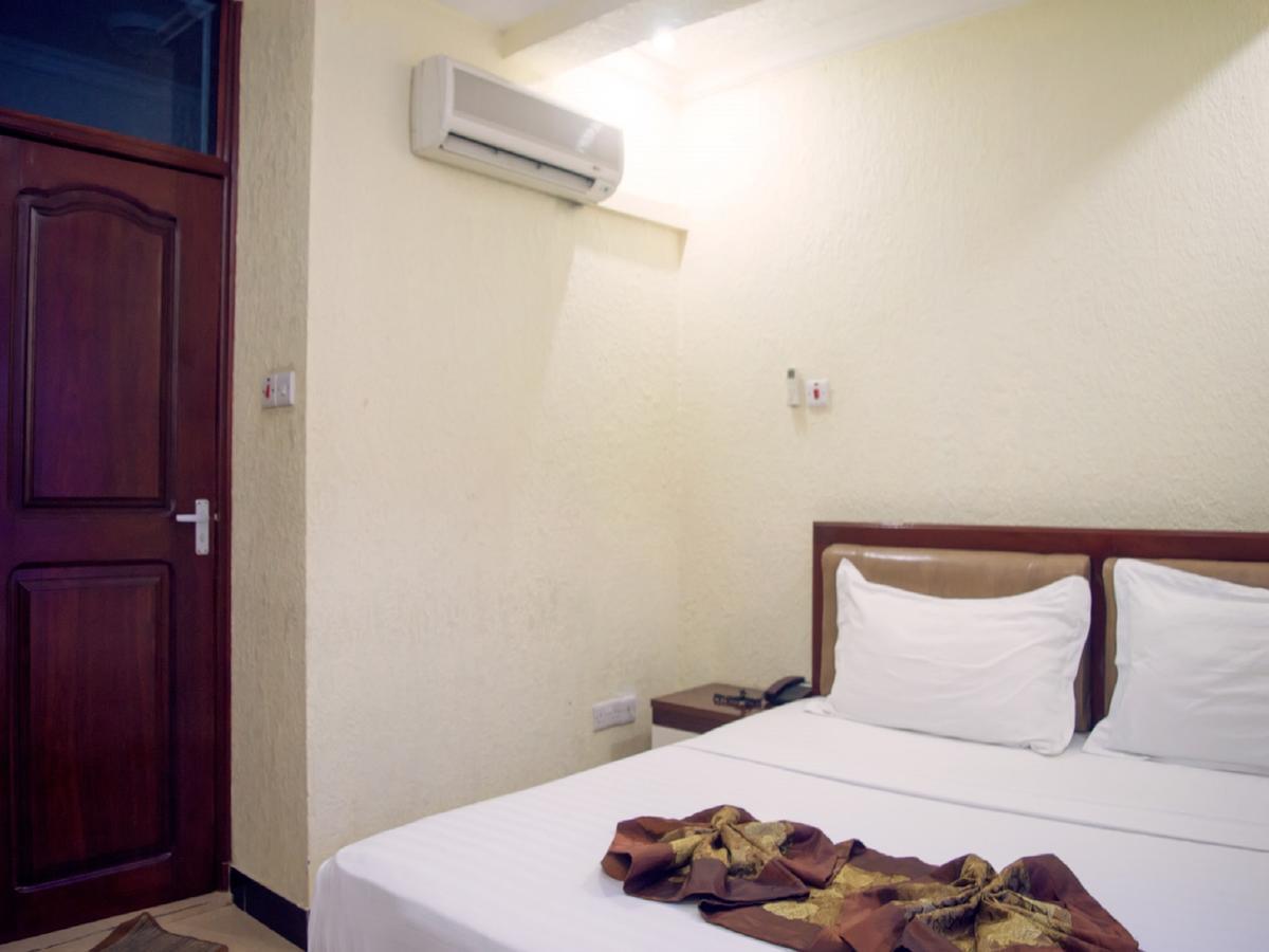 Best Point Hotel Daressalam Exterior foto