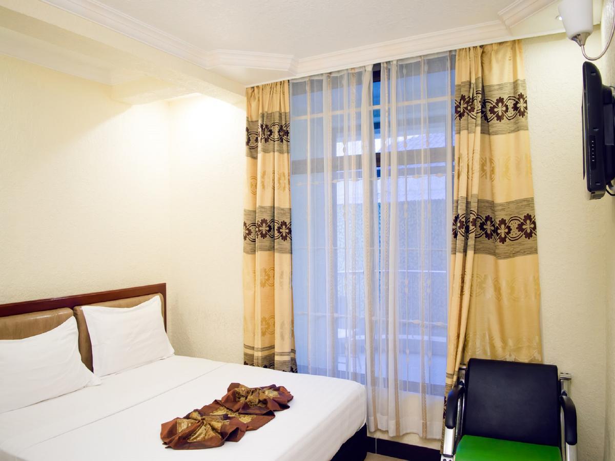 Best Point Hotel Daressalam Exterior foto