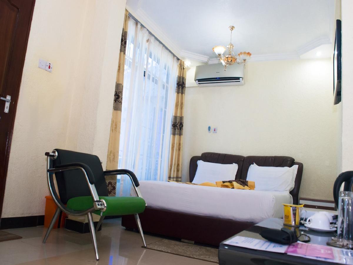 Best Point Hotel Daressalam Exterior foto